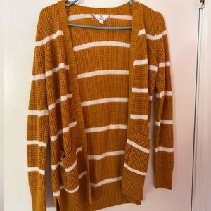 Mustard and white striped cardigan.
